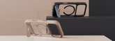 Two phone cases with a reflective surface on a neutral background