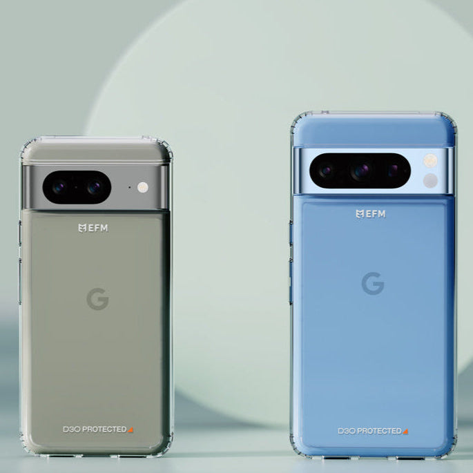 Two smartphones, one silver and one blue, on a light gray background